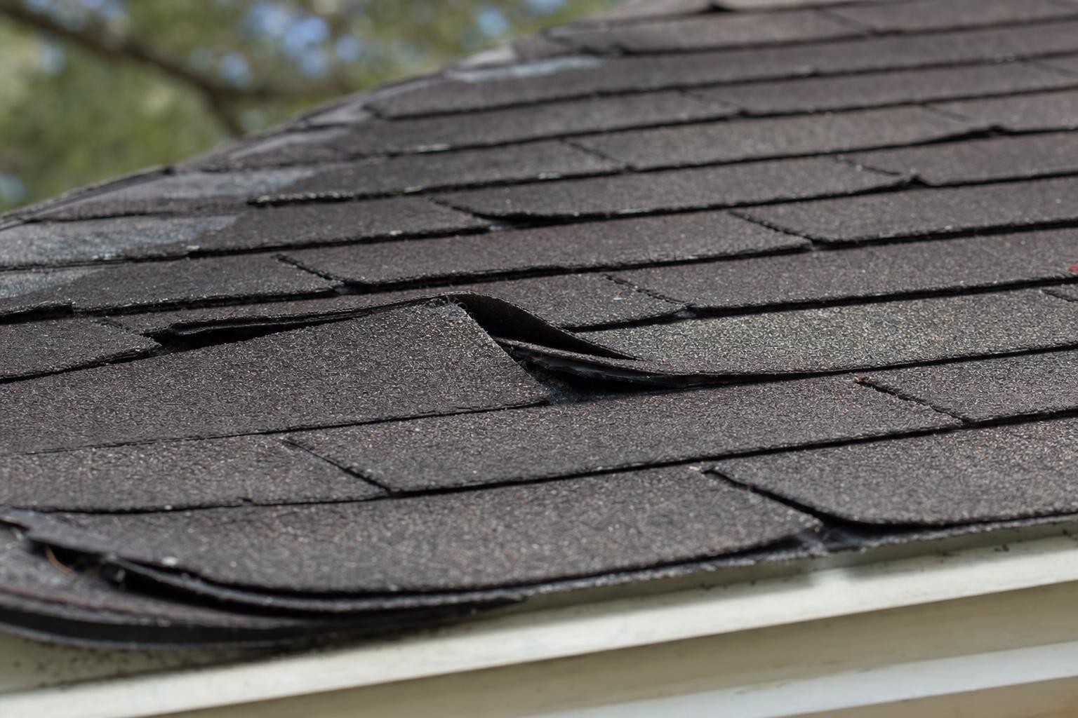 signs you need a new roof showing curling and missing shingles on a Duncanville home signs you need a new roof showing curling and missing shingles on a Duncanville home